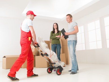 Furniture and boxes prepared for a house move in Abbey Wood