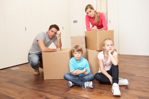 Careful wrapping and labelling of household items during a packing service