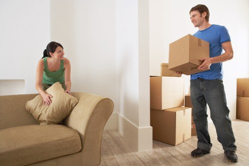 Boxes and household items prepared for a local van removal service